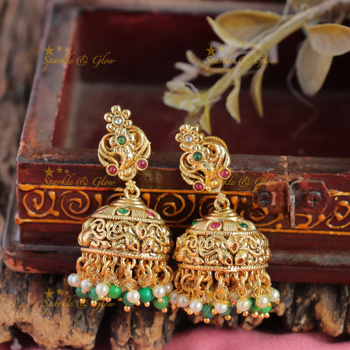 Exclusive Lakshmi peacock carved layer long necklace with ruby emerald gold and green beads