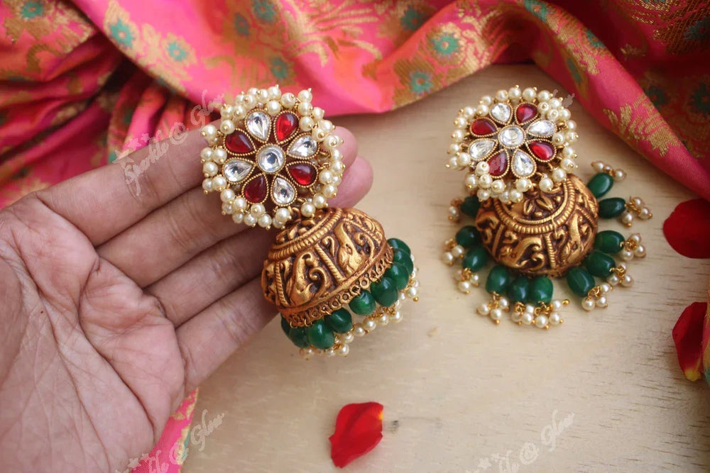 92.5 look alike geru gold polished flower studded jhumukas with gutta pusalu and green beads - Sparkle and Glow