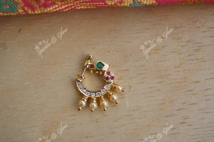 Gold polished AD stones peacock style nose pin - Sparkle and Glow