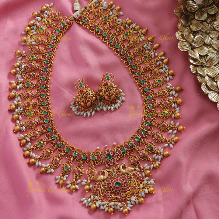 Gorgeous Mango peacock design long necklace with ruby emerald rice pearls and gold beads