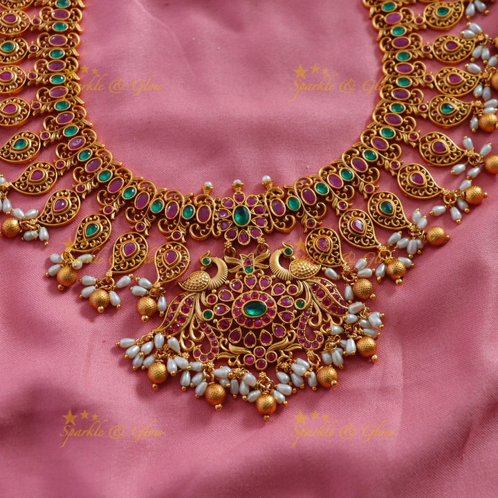 Gorgeous Mango peacock design long necklace with ruby emerald rice pearls and gold beads