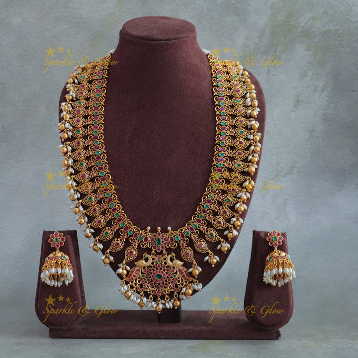 Gorgeous Mango peacock design long necklace with ruby emerald rice pearls and gold beads