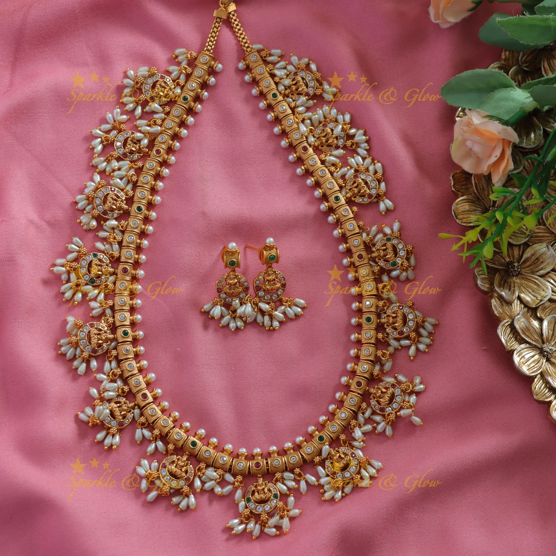 Beautiful Lakshmi carved gutta pusalu long necklace with multi colour stones and rice pearls