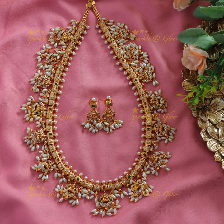Beautiful Lakshmi carved gutta pusalu long necklace with multi colour stones and rice pearls