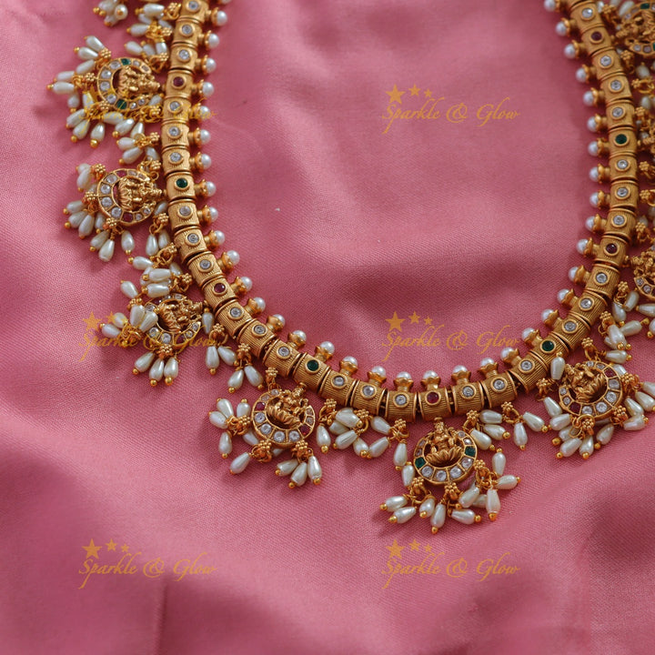 Beautiful Lakshmi carved gutta pusalu long necklace with multi colour stones and rice pearls