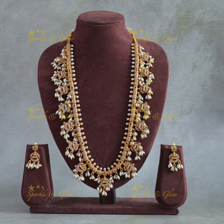 Beautiful Lakshmi carved gutta pusalu long necklace with multi colour stones and rice pearls