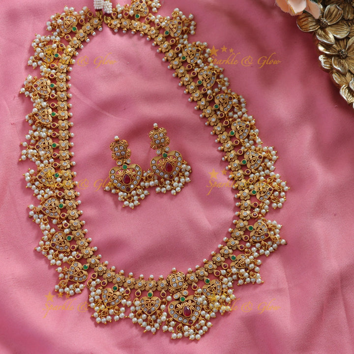 Stunning Leaf design gutta pusalu long necklace with ruby emerald and CZ stones