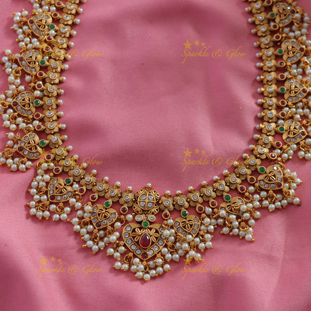 Stunning Leaf design gutta pusalu long necklace with ruby emerald and CZ stones