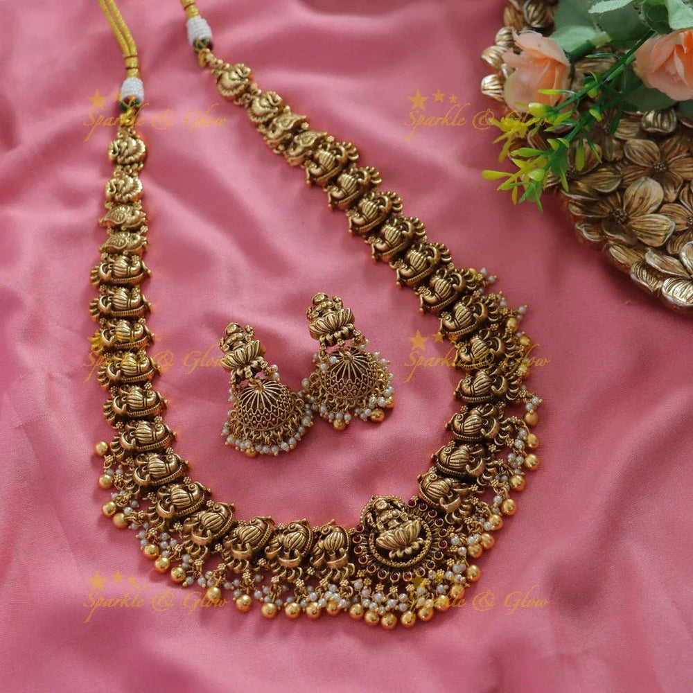 Grand Intricate Lakshmi peacock carved long necklace with gold beads - Sparkle and Glow