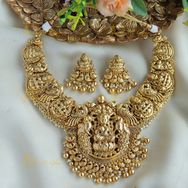 Gorgeous Lakshmi peacock carved short necklace with pearls and gold beads