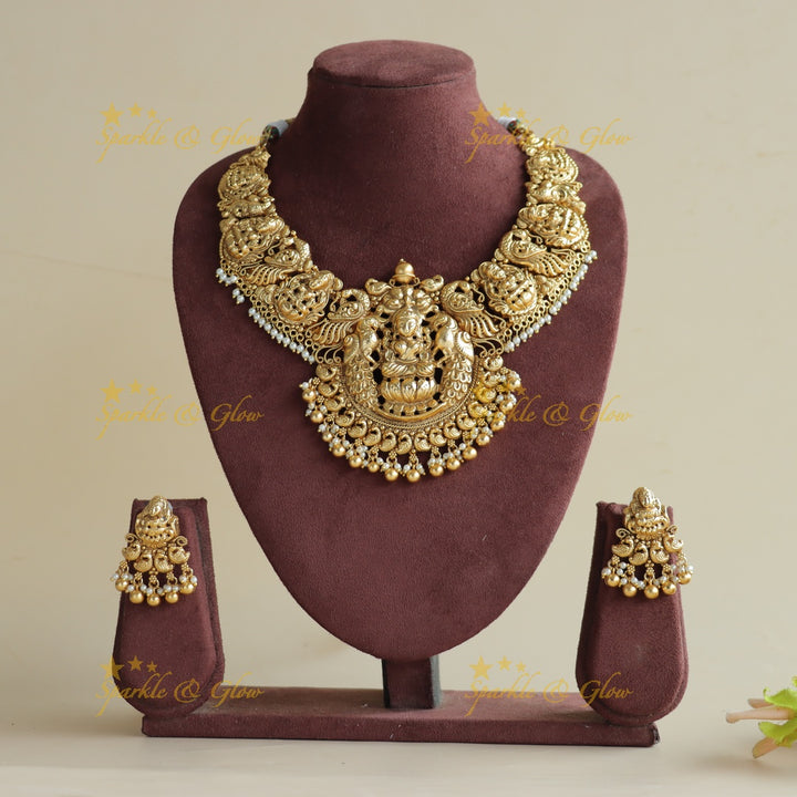 Gorgeous Lakshmi peacock carved short necklace with pearls and gold beads