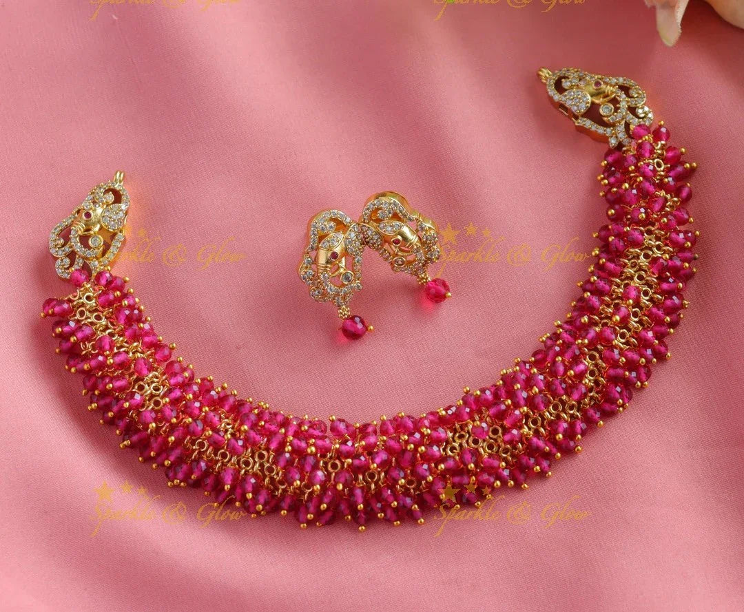 Gracious gold alike cluster Emerald beaded short necklace with Elephant Earrings - Sparkle and Glow