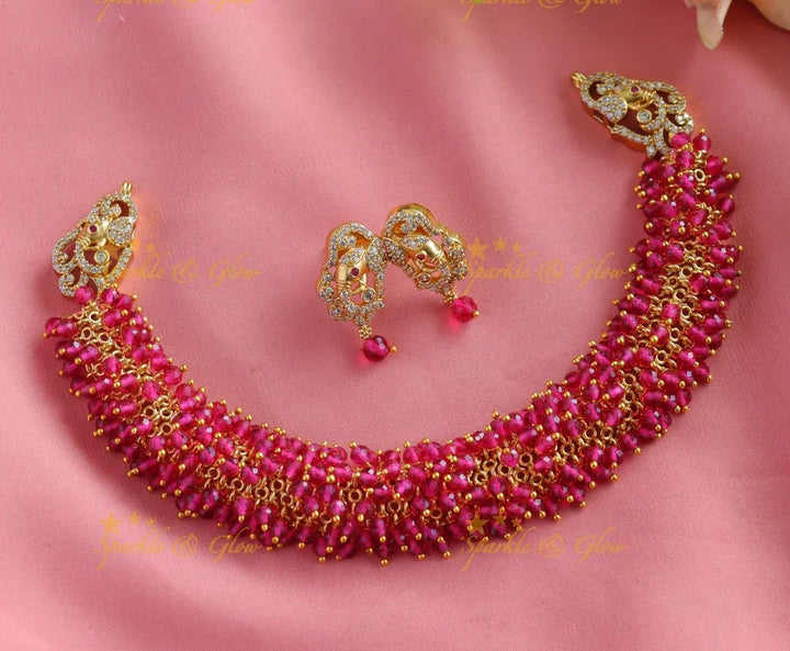Gracious gold alike cluster Emerald beaded short necklace with Elephant Earrings - Sparkle and Glow