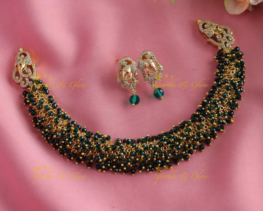 Gracious gold alike cluster Emerald beaded short necklace with Elephant Earrings - Sparkle and Glow