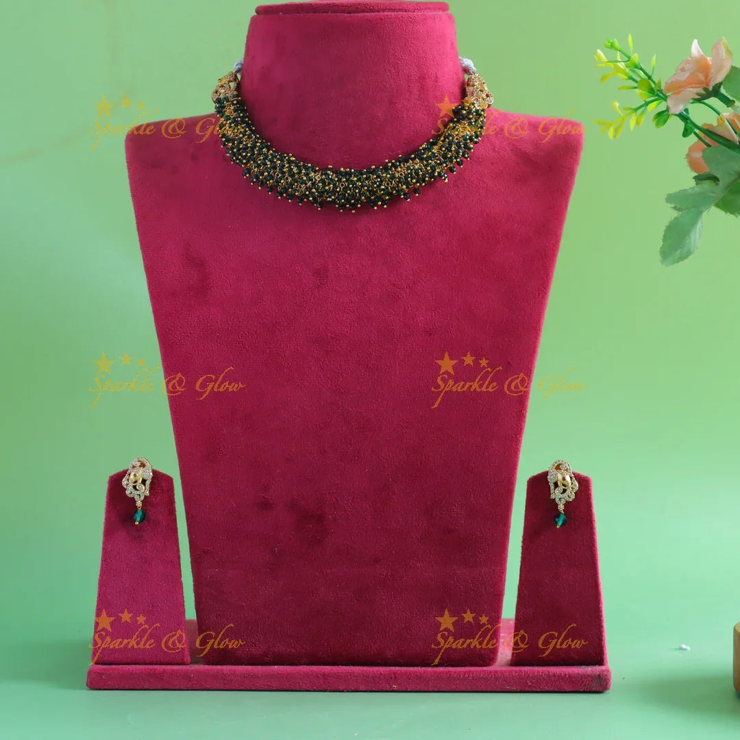 Gracious gold alike cluster Emerald beaded short necklace with Elephant Earrings - Sparkle and Glow