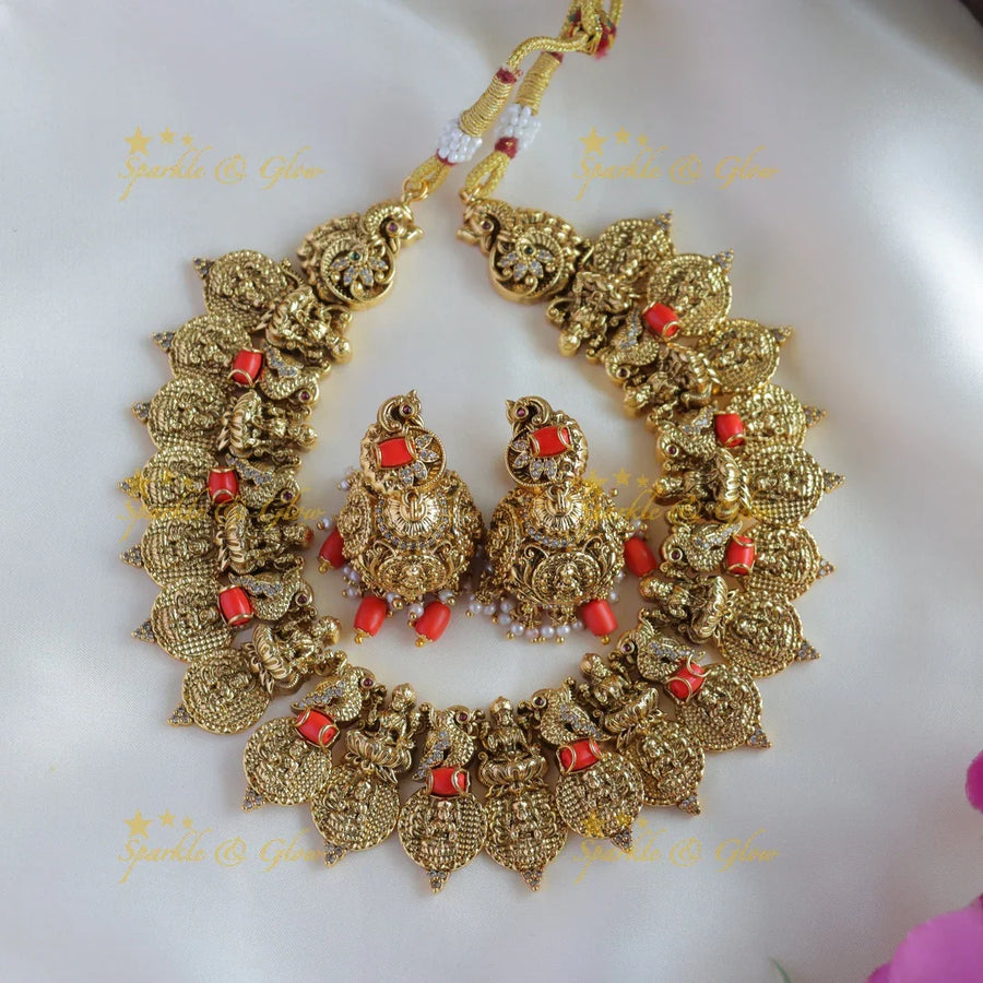 Beautiful Lakshmi peacock carved short necklace with coral and CZ stones - Sparkle and Glow