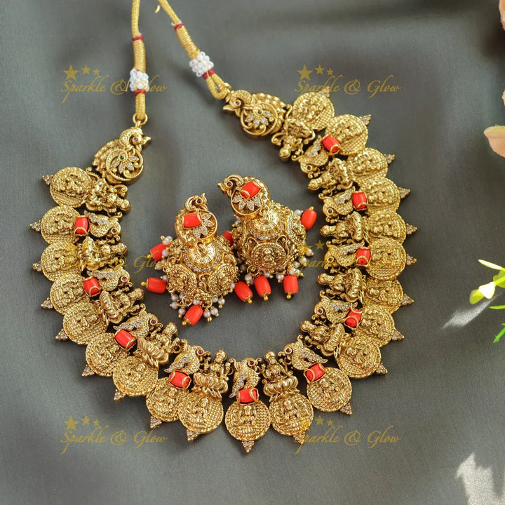 Beautiful Lakshmi peacock carved short necklace with coral and CZ stones - Sparkle and Glow