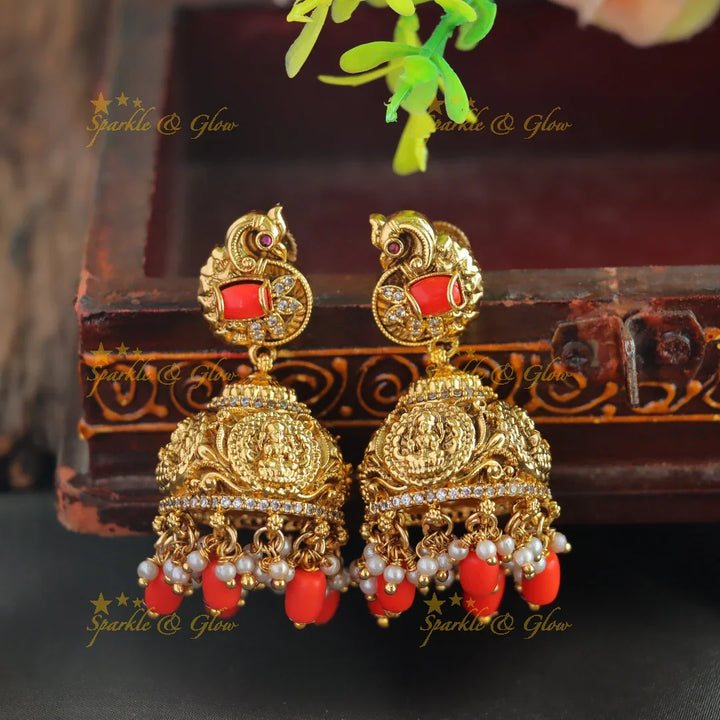 Beautiful Lakshmi peacock carved short necklace with coral and CZ stones - Sparkle and Glow