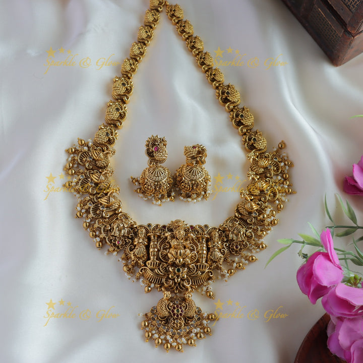 Grand intrecate Lakshmi peacock carved long necklace with stones pearls and gold beads