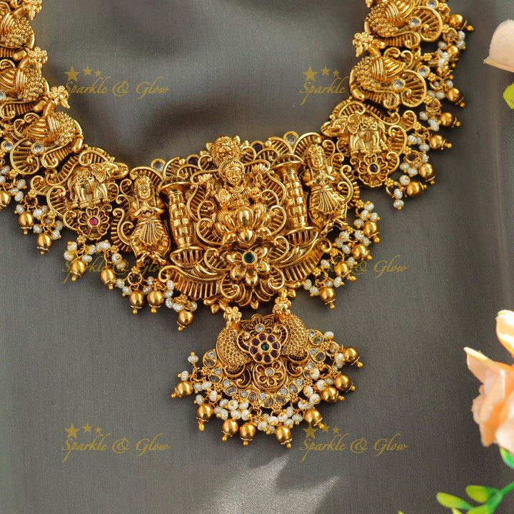 Grand intrecate Lakshmi peacock carved long necklace with stones pearls and gold beads