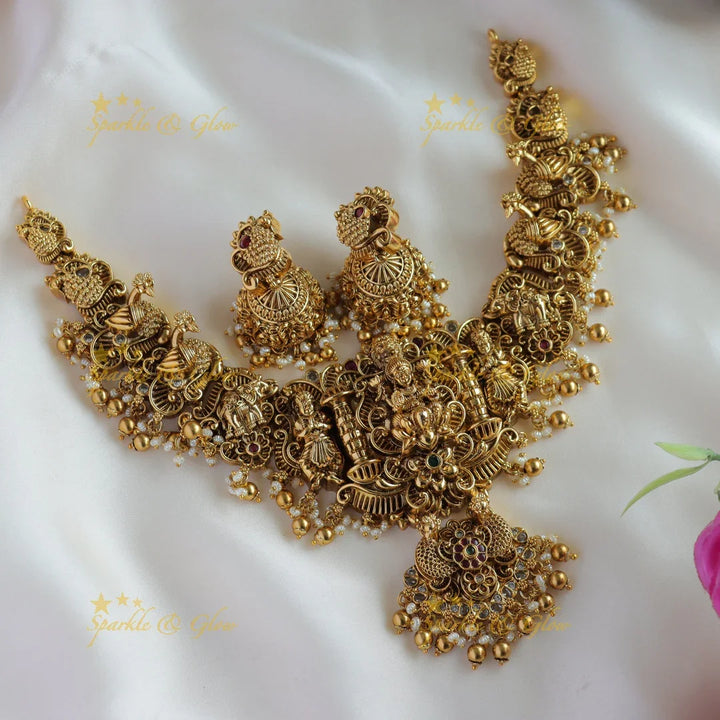 Beautiful Lakshmi peacock carved short necklace with stones pearls and gold beads - Sparkle and Glow