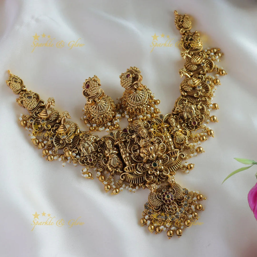 Beautiful Lakshmi peacock carved short necklace with stones pearls and gold beads - Sparkle and Glow