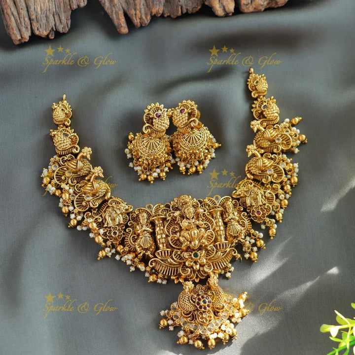 Beautiful Lakshmi peacock carved short necklace with stones pearls and gold beads - Sparkle and Glow