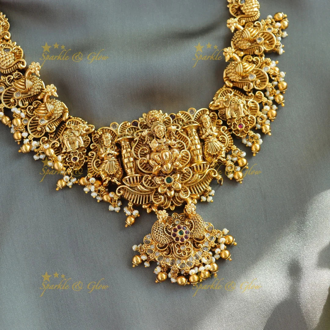 Beautiful Lakshmi peacock carved short necklace with stones pearls and gold beads - Sparkle and Glow