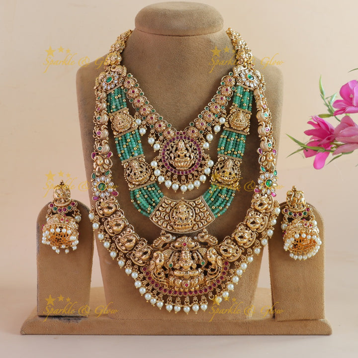 Grand Bridal Lakshmi peacock carved three layer haram with ruby emerald pearls and multi layer mint green beads