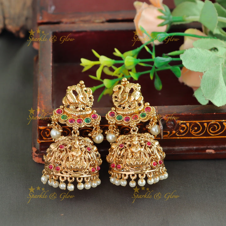 Grand Bridal Lakshmi peacock carved three layer haram with ruby emerald pearls and multi layer mint green beads