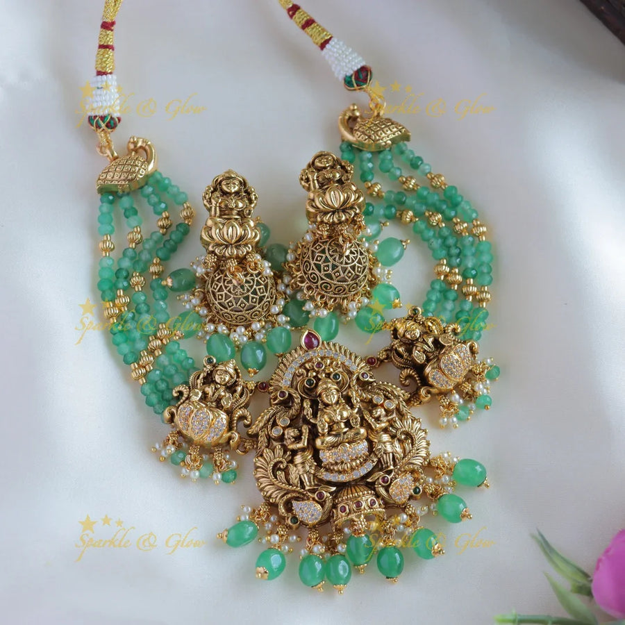 Statement Lakshmi peacock carved short necklace with multi layer mint green beads - Sparkle and Glow