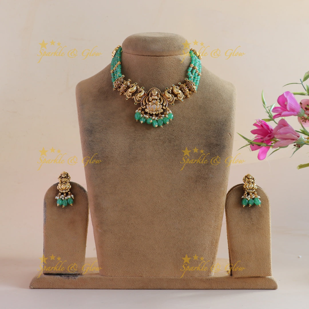 Elegant Lakshmi peacock carved short necklace with multi layer mint green beads and CZ stones