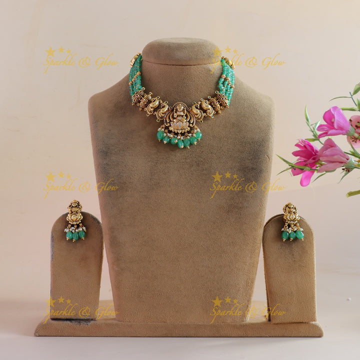 Elegant Lakshmi peacock carved short necklace with multi layer mint green beads and CZ stones