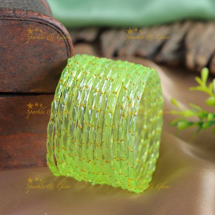 Beautiful Big drop glass bangles set of 12 bangles, (one dozen ), with gold dots - baby pink