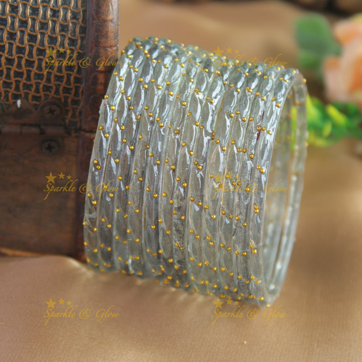 Beautiful Big drop glass bangles set of 12 bangles, (one dozen ), with gold dots - baby pink
