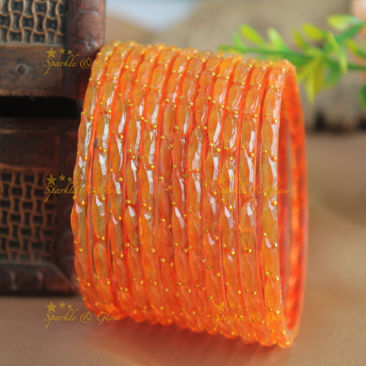Beautiful Big drop glass bangles set of 12 bangles, (one dozen ), with gold dots - baby pink