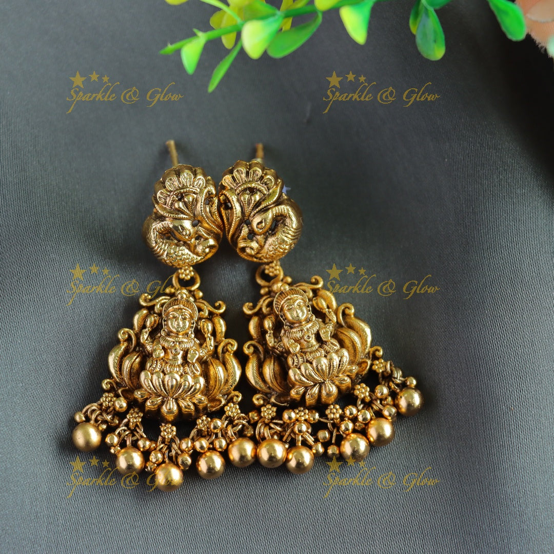 Gorgeous Lakshmi peacock carved coin long necklace