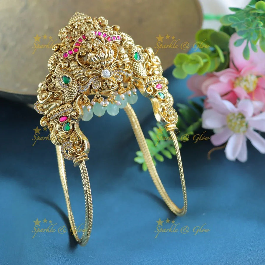 Jadau Grand Idol Lakshmi Peacock carved U shape Vanki - Sparkle and Glow