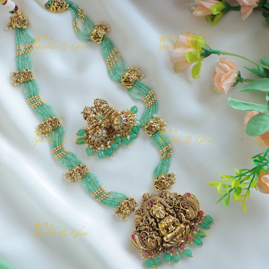 Grand Idol Lakshmi Peacock pendant Haram with multilayered mintgreen beads - Sparkle and Glow - 
