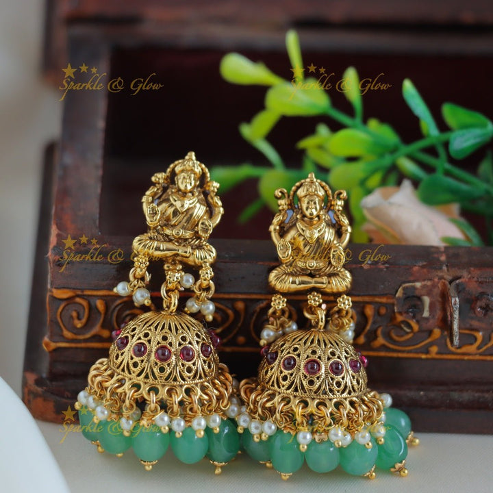 Grand Idol Lakshmi Peacock pendant Haram with multilayered mintgreen beads - Sparkle and Glow - 