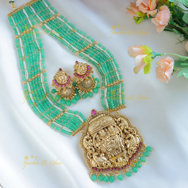 Grand Nagas pendant Haram with multilayered mintgreen beads