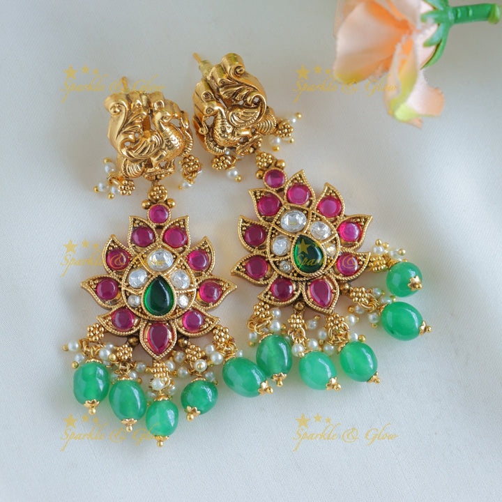 Grand Idol Krishna and Dancing peacock Haram with multilayered mintgreen beads
