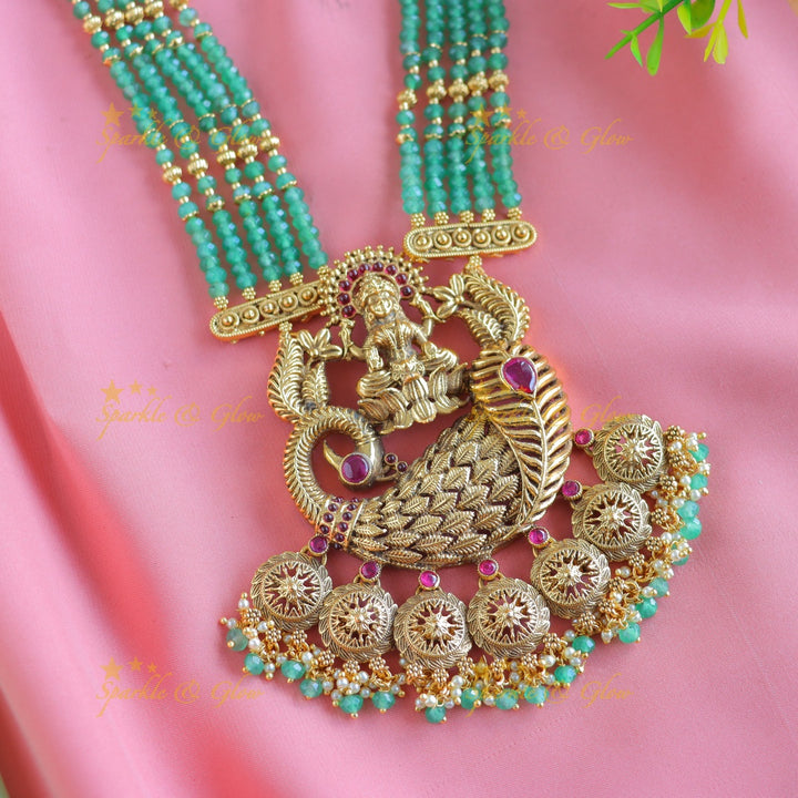 Grand Idol Lakshmi Peacock pendant Haram with multilayered mintgreen beads