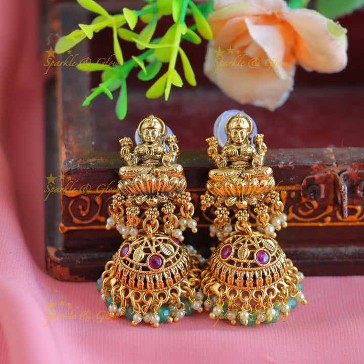 Grand Idol Lakshmi Peacock pendant Haram with multilayered mintgreen beads
