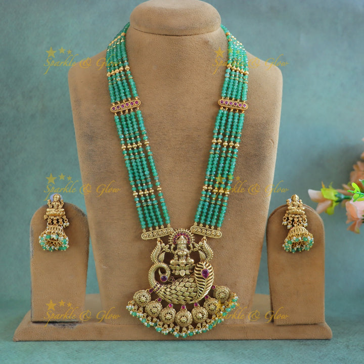 Grand Idol Lakshmi Peacock pendant Haram with multilayered mintgreen beads