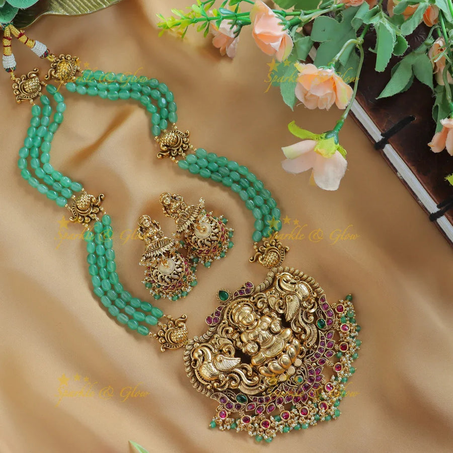 Grand Kemp Idol Lakshmi Peacock Floral pendant Haram with multilayered mintgreen beads-Green - Sparkle and Glow