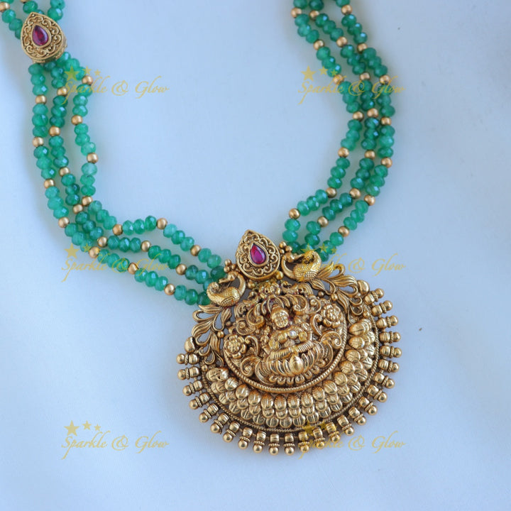 Grand Idol Lakshmi Peacock Floral pendant Haram with three layered mintgreen beads