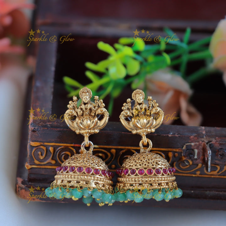 Grand Idol Lakshmi Peacock Floral pendant Haram with three layered mintgreen beads