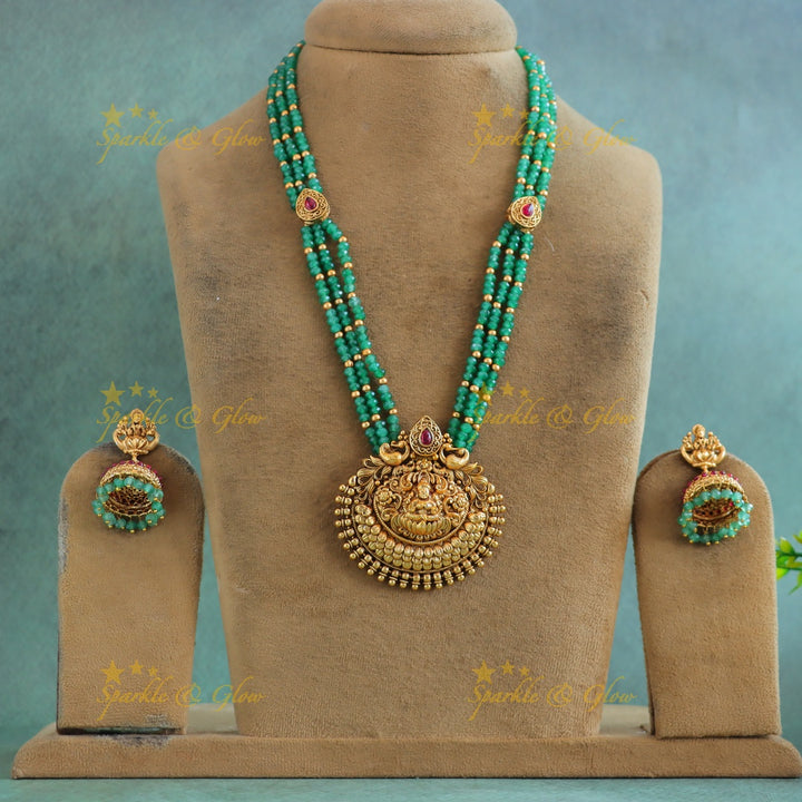 Grand Idol Lakshmi Peacock Floral pendant Haram with three layered mintgreen beads