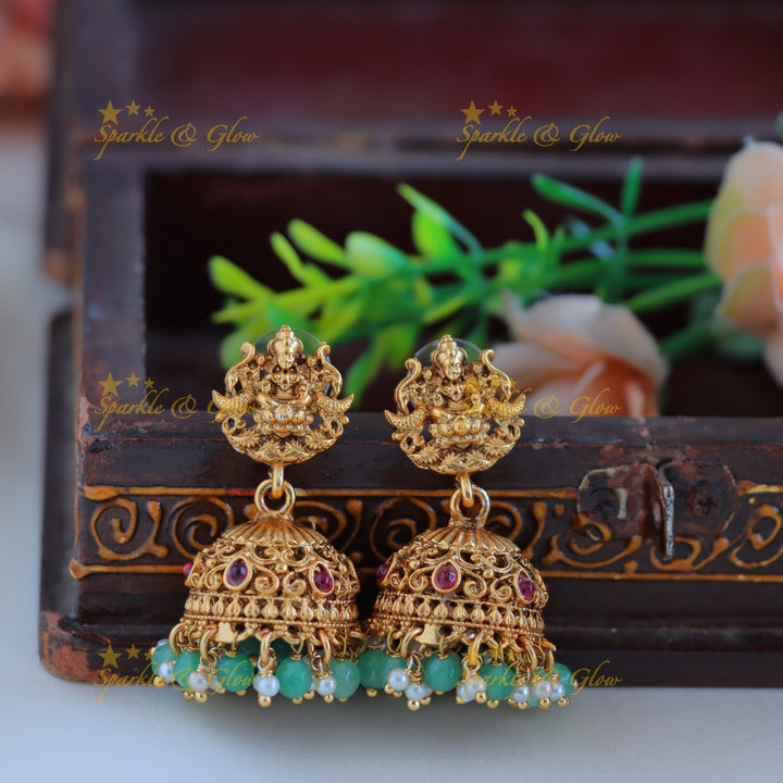 Grand Kemp Lakshmi Floral pendant haram with three layered peacock mintgreen beads